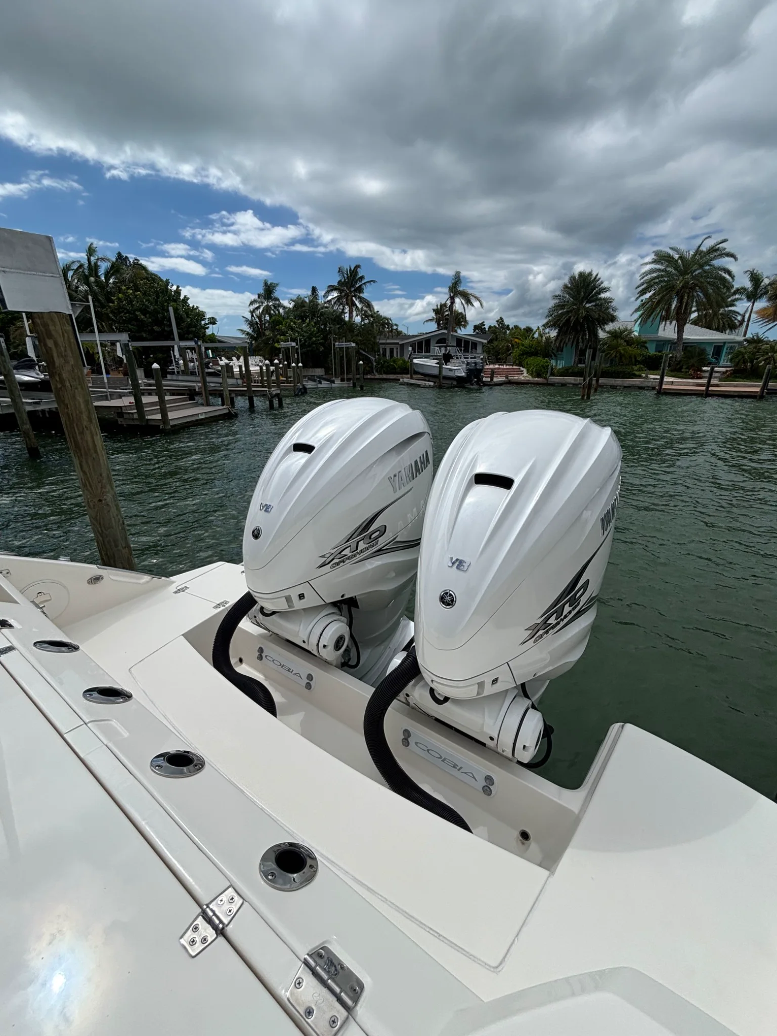 Twin white Yamaha outboards and clean aft deck